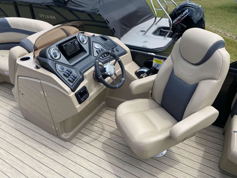 Slide: The Image of 2025 Sylvan L1 LZ Tritoon boat interior with Mercury 150HP engine, featuring a modern helm. - 6