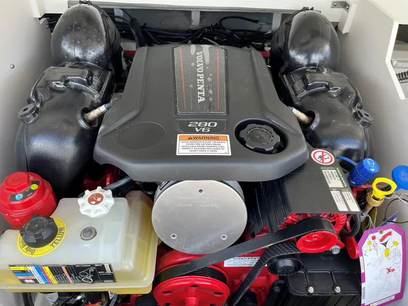Slide: The Image of Volvo Penta 280 V6 engine in 2025 Crownline 220 SS boat, detailed view. - 12