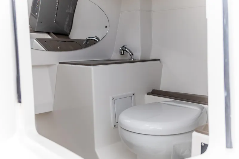 Slide: The Image of 2026 Edgewater 262 CX boat interior with modern bathroom amenities. - 30