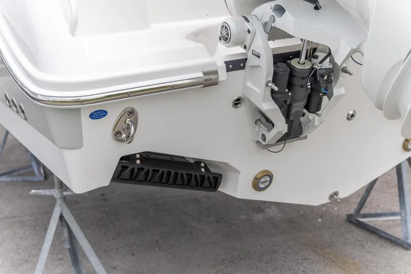 Slide: The Image of Edgewater 262 CX 2026 boat stern with motor mount and hardware details. - 9
