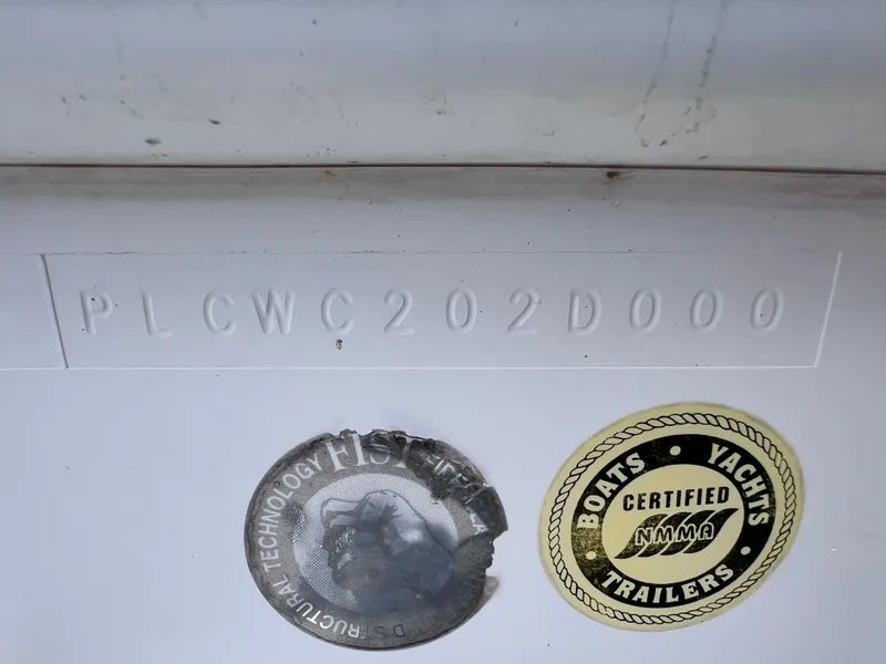 Slide: The Image of 2000 Pro-Line 20 WALK AROUND boat hull identification number and certification stickers. - 8