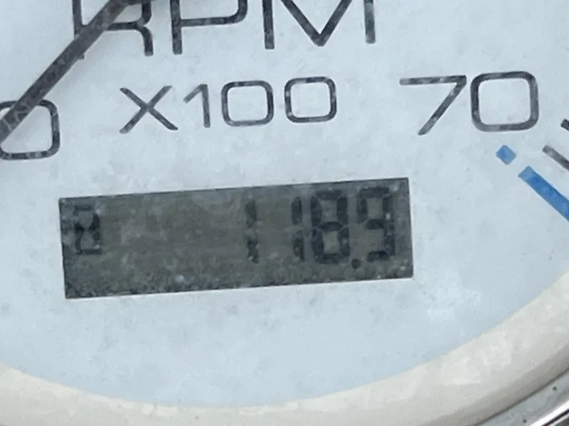 Slide: The Image of Close-up of RPM gauge reading 1189 on a 2017 Carolina Skiff 18 JVX CC. - 10