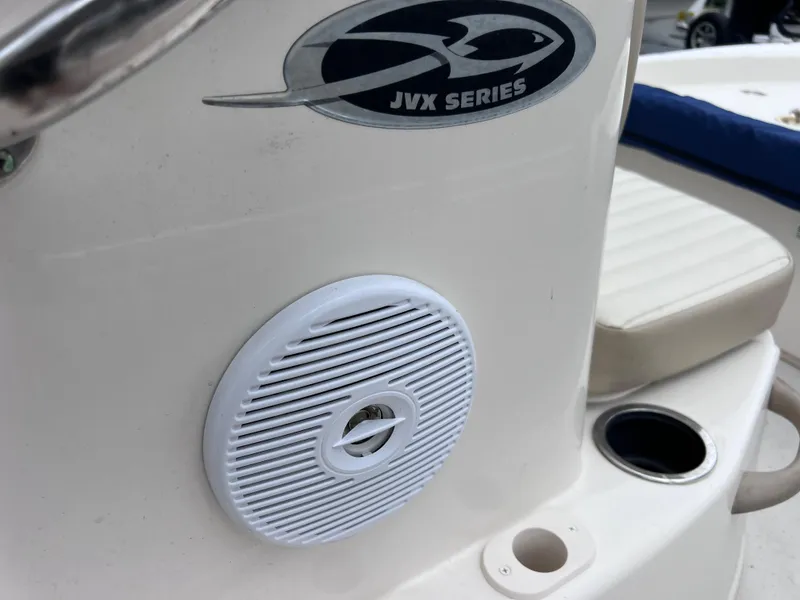 Slide: The Image of 2017 Carolina Skiff 18 JVX CC boat with speaker and JVX Series logo. - 14