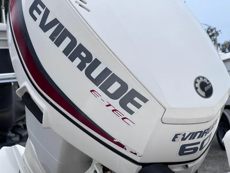 Slide: The Image of Evinrude E-TEC 60 outboard motor on 2017 Carolina Skiff 18 JVX CC boat. - 6