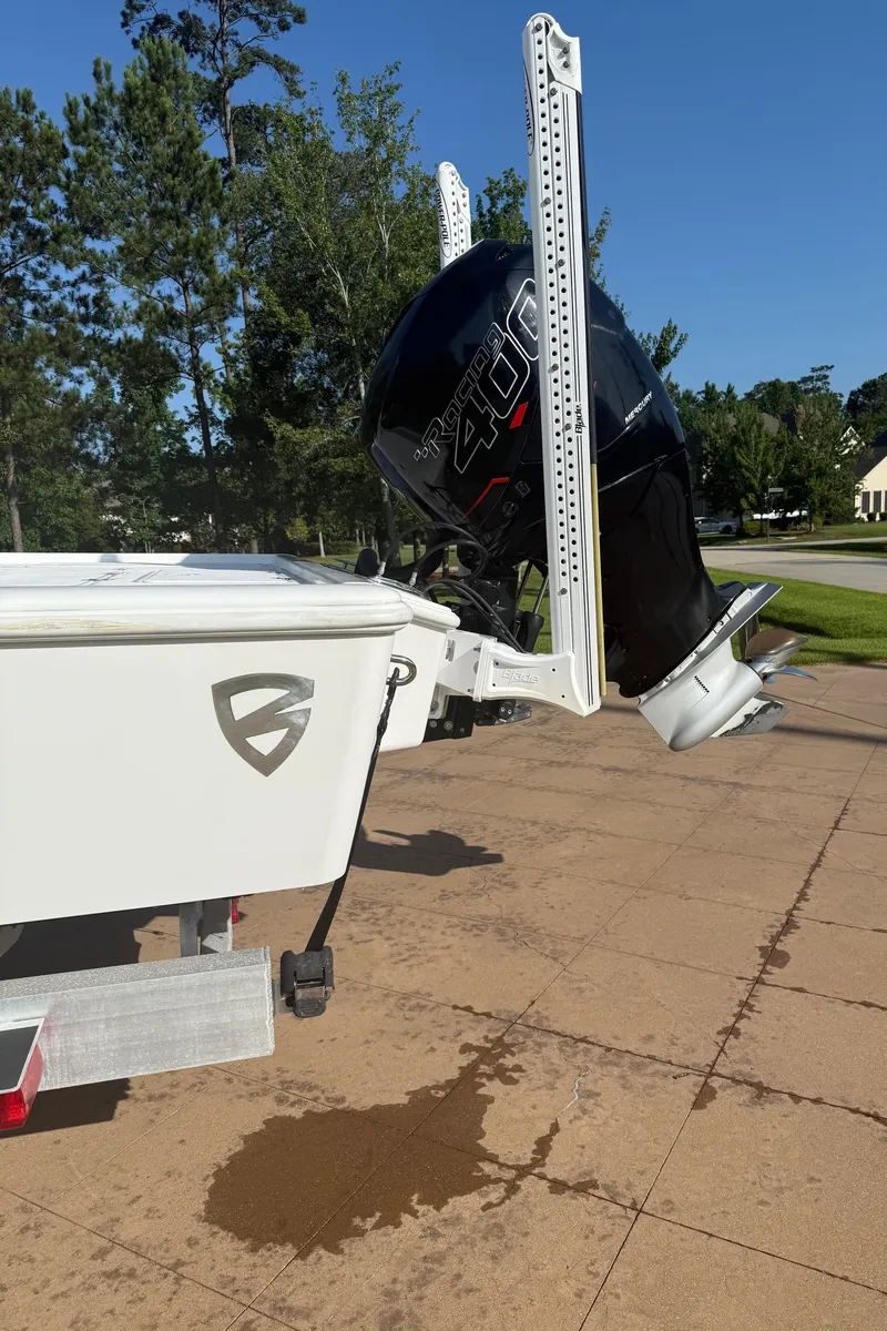 Slide: The Image of 2016 Barker Boatworks Calibouge with powerful outboard motor on a sunny day. - 12