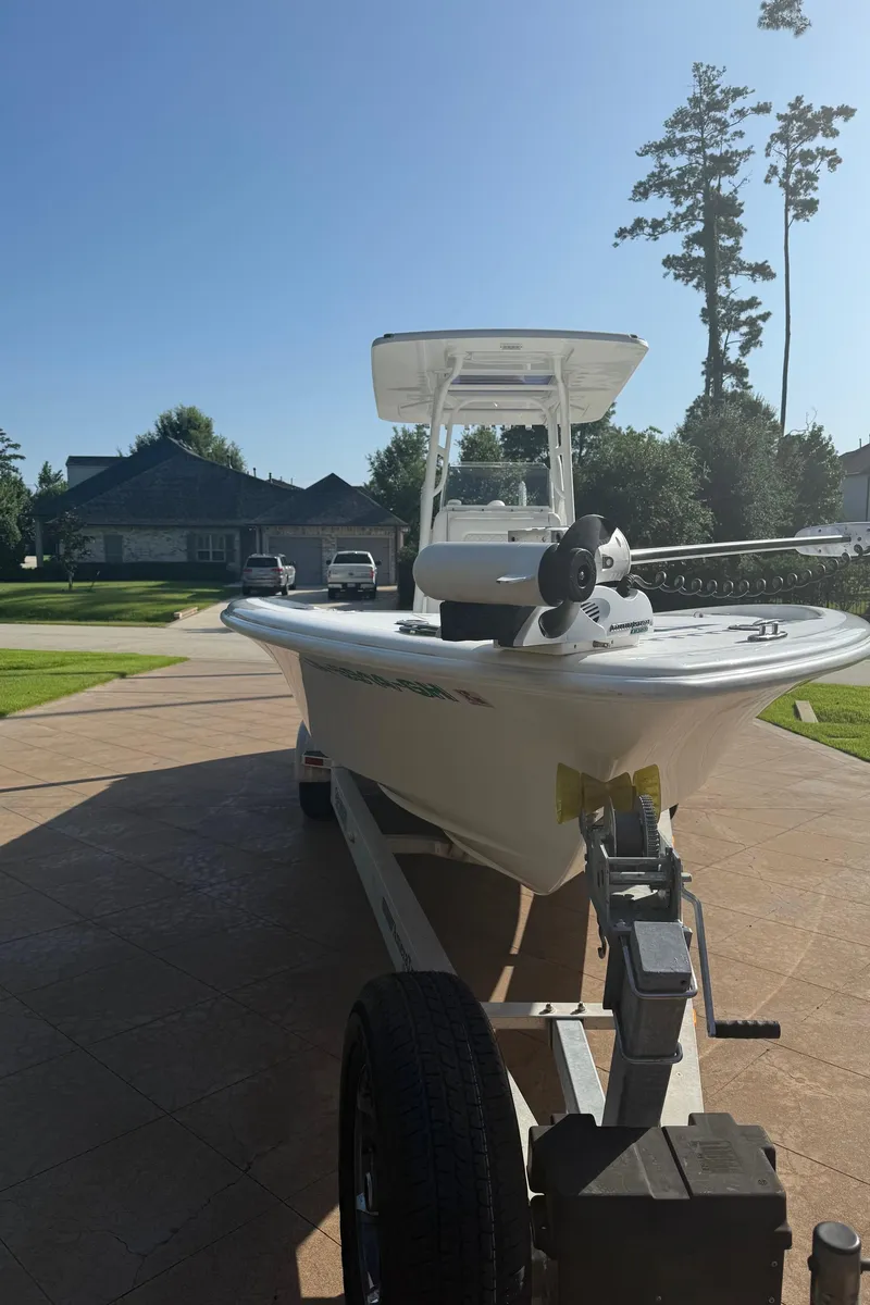 Slide: The Image of 2016 Barker Boatworks Calibouge on trailer in sunny residential driveway. - 16