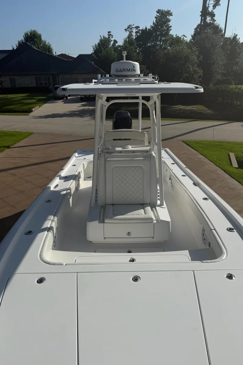 Slide: The Image of 2016 Barker Boatworks Calibouge with Garmin equipment, docked in a residential area. - 7