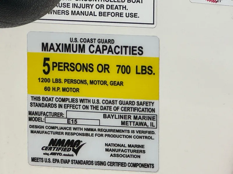 Slide: The Image of 2024 Bayliner Element M15 capacity label, 5 persons or 700 lbs, 60 HP motor. - 10