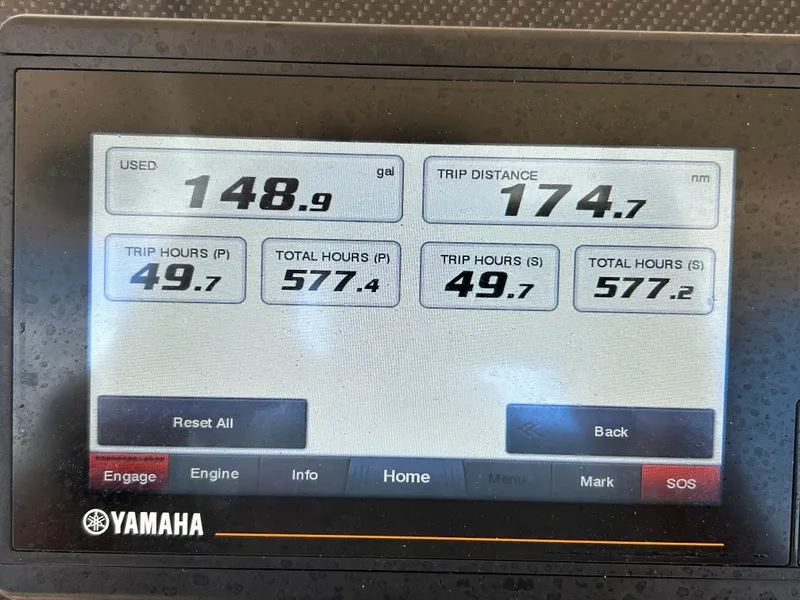Slide: The Image of Display screen showing fuel usage, trip distance, and engine hours for 2019 Grady-White Canyon 306. - 15