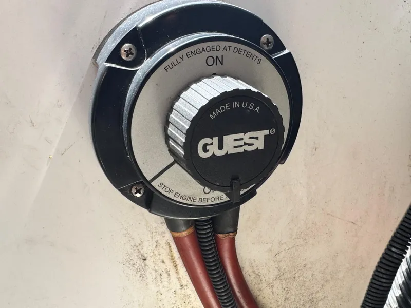Slide: The Image of Close-up of a Guest battery switch on a 2008 Sea Ray 185 Sport boat. - 14