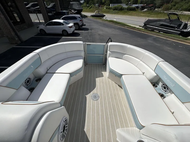 Slide: The Image of 2025 South Bay S224 Chill pontoon boat interior with spacious seating and modern design. - 29