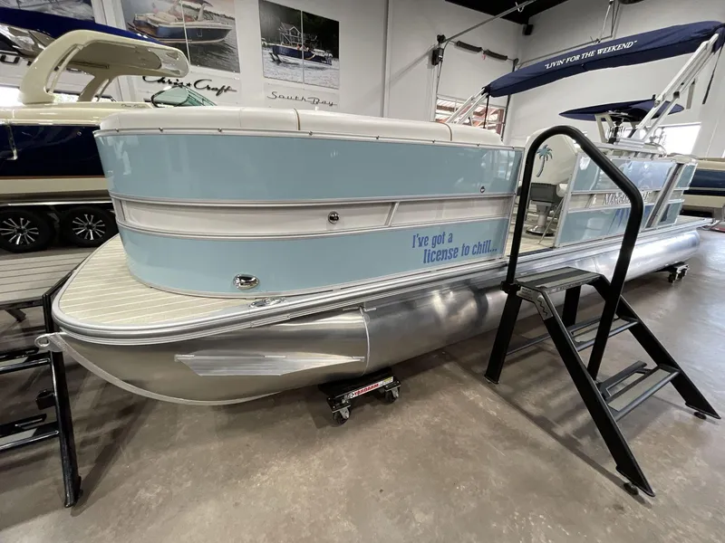 Slide: The Image of 2025 South Bay S224 Chill pontoon boat with "I've got a license to chill" text. - 3