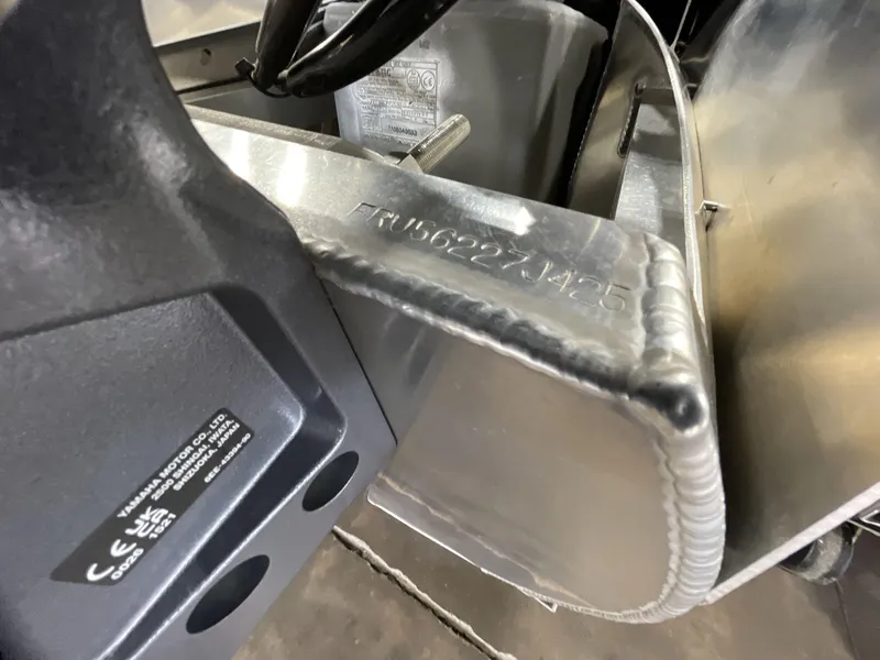 Slide: The Image of 2025 South Bay S224 Chill boat detail with serial number and Yamaha motor label. - 6