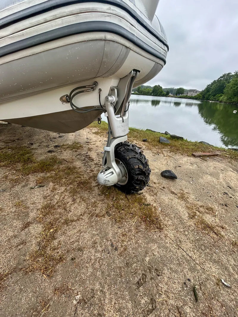 Slide: The Image of 2014 Sealegs 7.1m RIB with amphibious wheel on sandy shore. - 12
