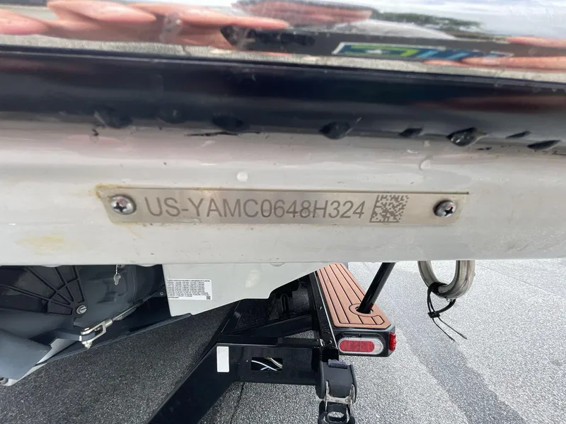 Slide: The Image of 2024 Yamaha Boats 252XE hull identification number plate close-up. - 12
