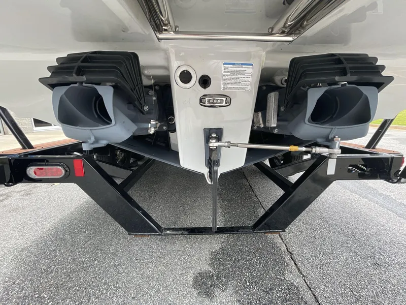 Slide: The Image of Rear view of 2024 Yamaha Boats 252XE jet propulsion system on trailer. - 14