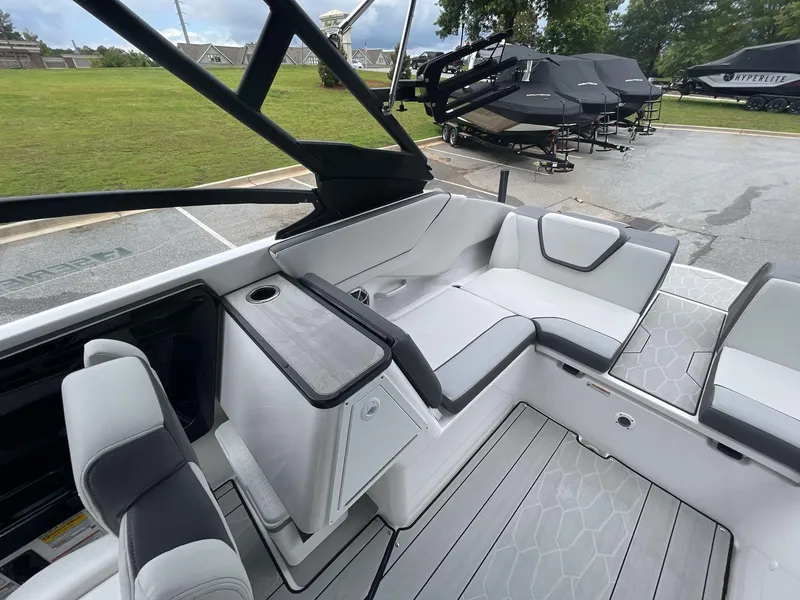 Slide: The Image of 2024 Yamaha Boats 252XE interior with sleek seating and modern design. - 15