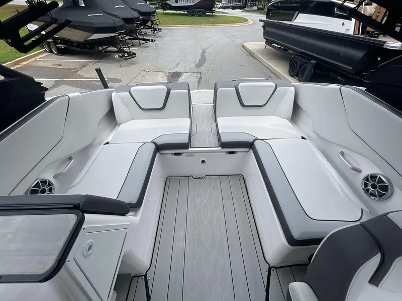 Slide: The Image of 2024 Yamaha Boats 252XE interior with sleek seating and modern design. - 18
