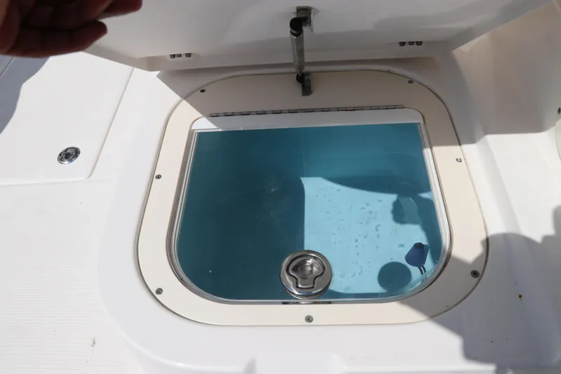 Slide: The Image of Livewell compartment on a 2008 Robalo R227 Dual Console boat. - 27