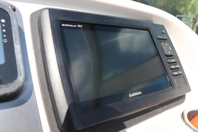Slide: The Image of Garmin echomap SV on 2008 Robalo R227 Dual Console boat dashboard. - 33