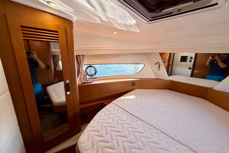 Slide: The Image of Luxurious cabin interior of 2026 Beneteau Swift Trawler 37 Fly yacht. - 15