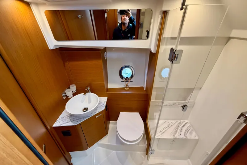 Slide: The Image of Modern bathroom in 2026 Beneteau Swift Trawler 37 Fly, featuring sleek design and amenities. - 18