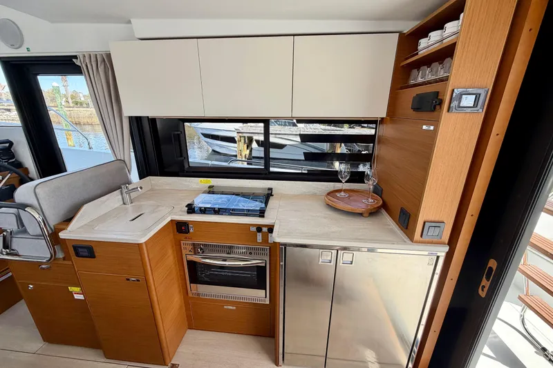 Slide: The Image of Modern kitchen interior of 2026 Beneteau Swift Trawler 37 Fly yacht. - 21