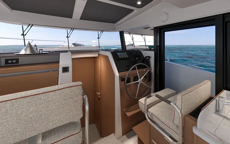 Slide: The Image of Interior of 2026 Beneteau Swift Trawler 37 FLY, featuring helm and ocean view. - 9