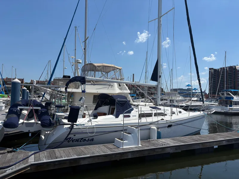 Slide: The Image of Catalina 350 sailboat docked at marina, clear sky, 2006 model. - 0