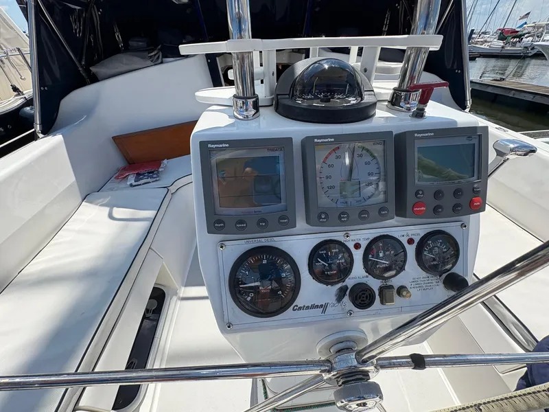 Slide: The Image of Cockpit of 2006 Catalina 350 sailboat with navigation instruments and compass. - 10