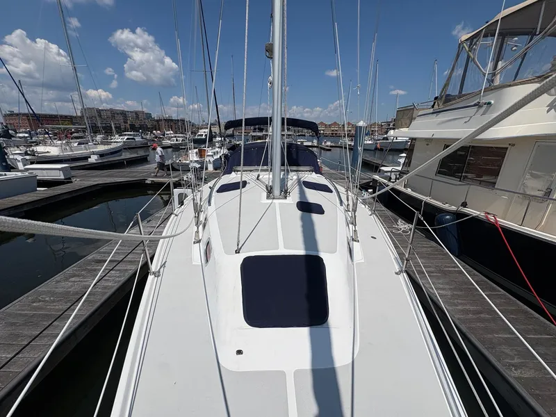 Slide: The Image of Catalina 350 sailboat docked at marina, clear sky, 2006 model. - 17