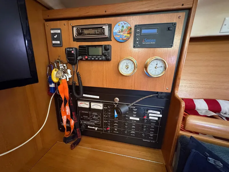 Slide: The Image of Control panel of a 2006 Catalina 350 sailboat with gauges and electronics. - 46