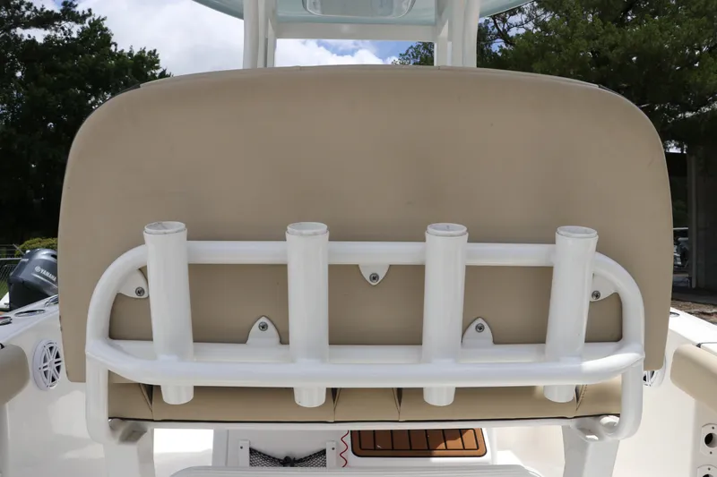 Slide: The Image of 2022 Tidewater 232 SS boat with rod holders and beige seating. - 16