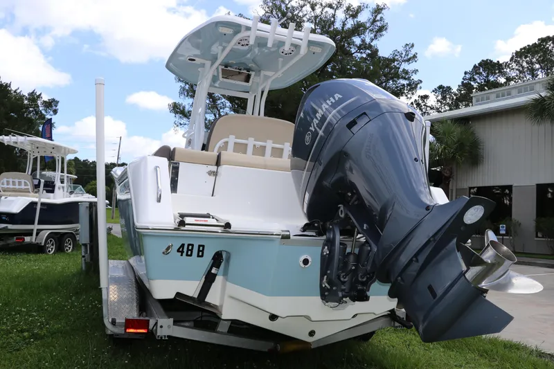 Slide: The Image of 2022 Tidewater 232 SS boat with Yamaha outboard motor on trailer. - 2