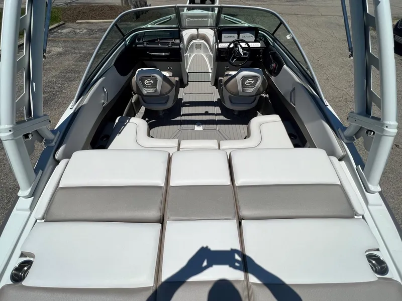 Slide: The Image of 2025 Crownline 220 SS boat interior with seating and dashboard view. - 3