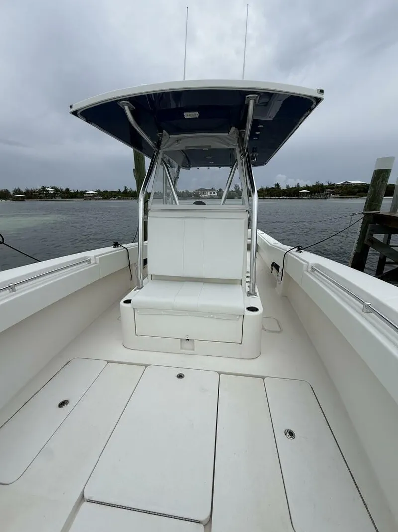 Slide: The Image of 2012 Invincible 36 Open Fisherman boat with spacious deck and seating. - 5