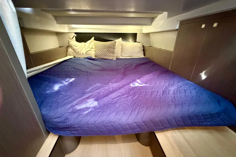 Slide: The Image of Luxurious cabin interior of 2026 Beneteau Gran Turismo 35 yacht with cozy bedding. - 28