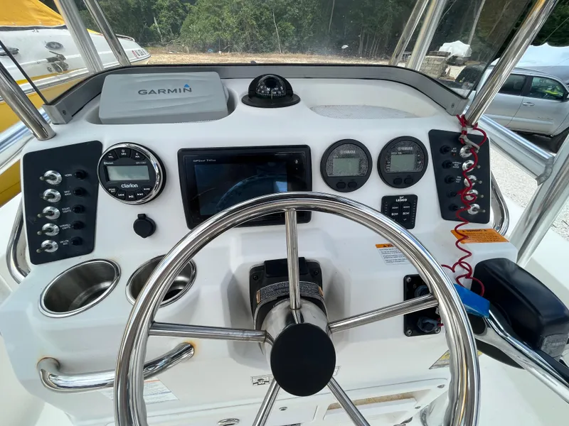 Slide: The Image of Control panel of 2016 Robalo 206 Cayman boat with Garmin navigation system. - 19