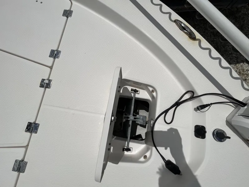 Slide: The Image of 2016 Robalo 206 Cayman boat deck with open hatch and wiring. - 28