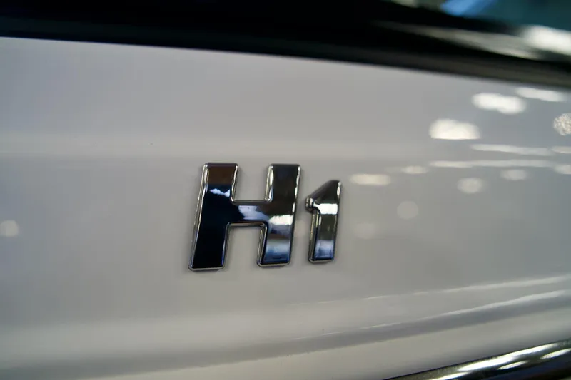 Slide: The Image of Close-up of 2026 Four Winns H1 logo on white surface. - 18