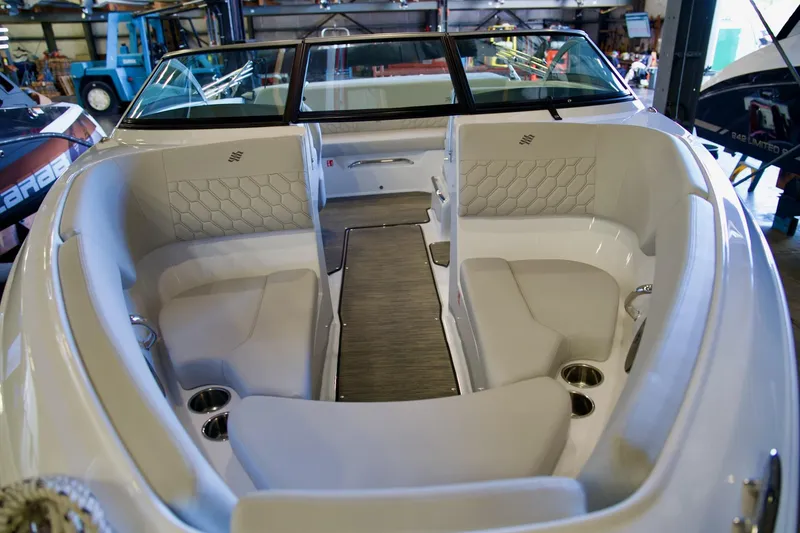 Slide: The Image of 2026 Four Winns H1 boat interior with sleek seating and modern design. - 4
