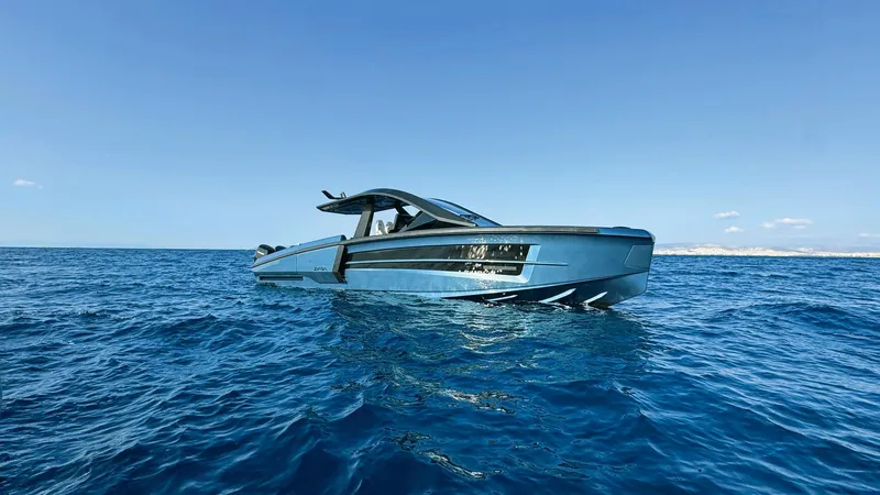 Slide: The Image of Luxury yacht "Introductory ZYARA 44" cruising on open sea, 2025 model. - 0