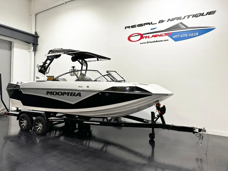 Slide: The Image of 2021 Moomba Kaiyen boat on trailer in showroom, Regal & Nautique of Orlando. - 3