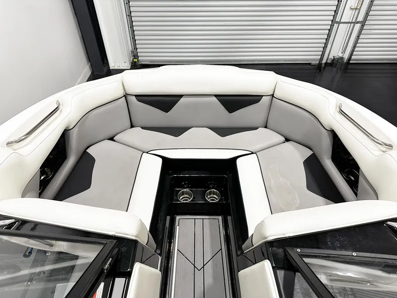 Slide: The Image of Interior of 2021 Moomba Kaiyen boat with white and gray seating. - 5