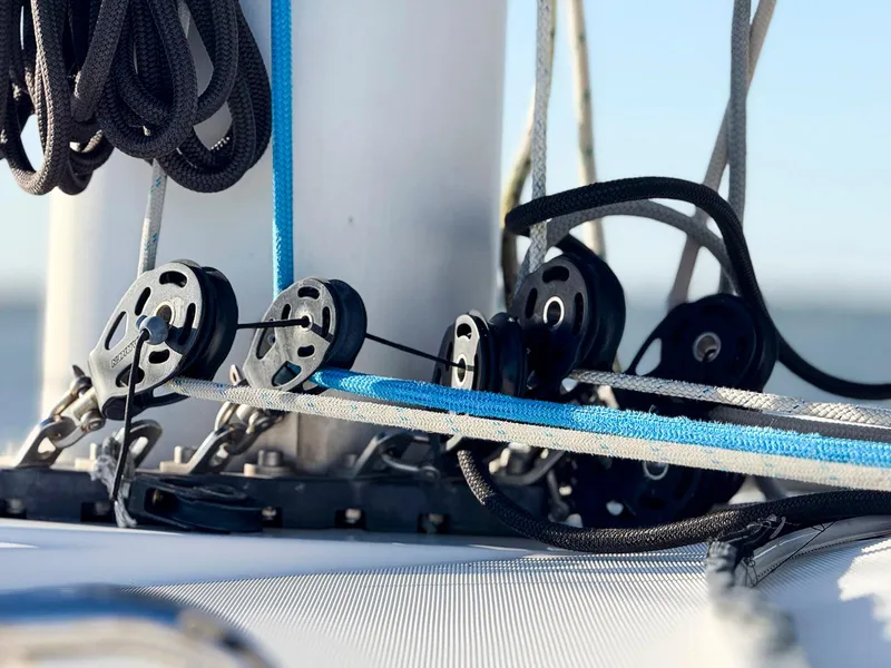 Slide: The Image of Anchor windlass on a 2017 Lagoon 42 catamaran with rusty chain. - 13