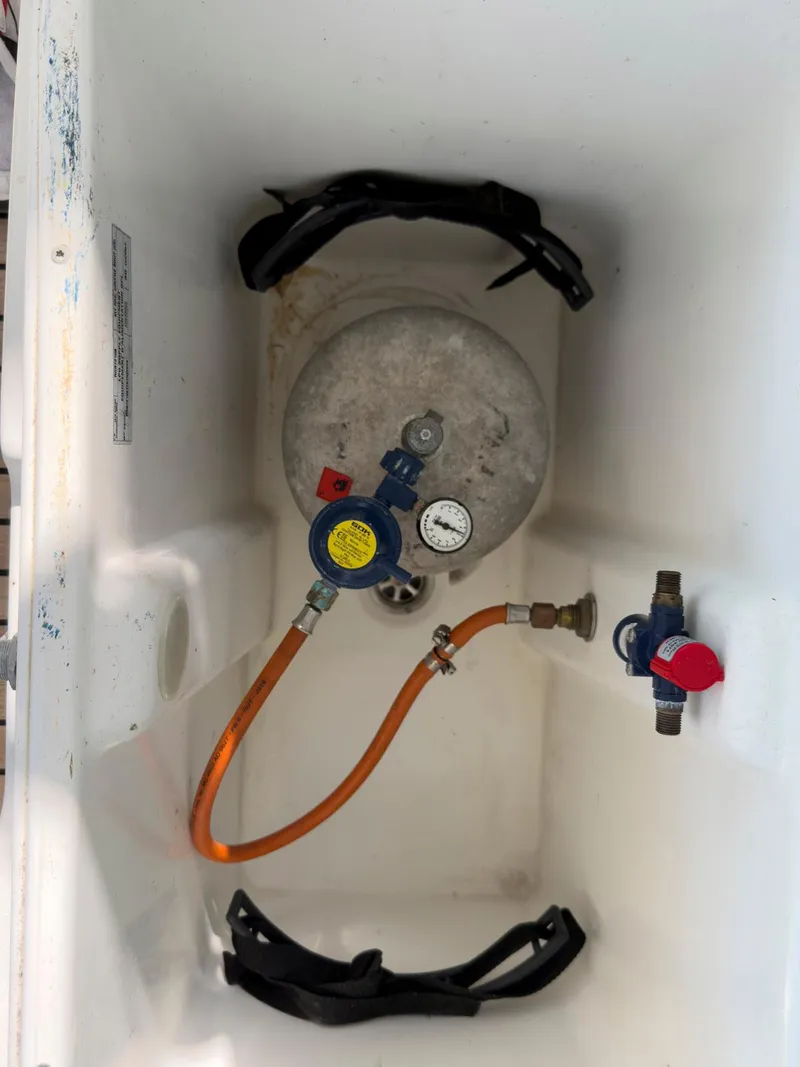 Slide: The Image of Interior view of a 2017 Lagoon 42 yacht showing wiring and tubing. - 30