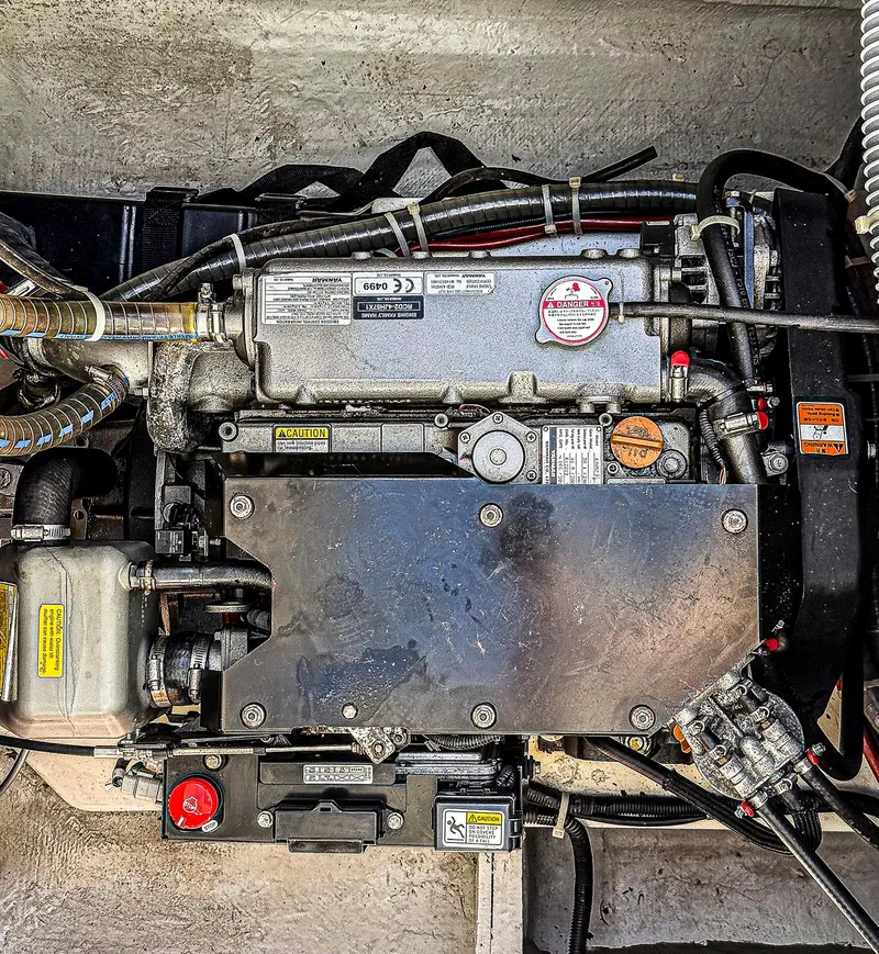 Slide: The Image of Wooden compartment housing a cylindrical tank in a 2017 Lagoon 42 yacht. - 32