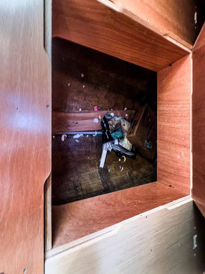 Slide: The Image of Control panel of a 2017 Lagoon 42 yacht, featuring various electronic displays and switches. - 33