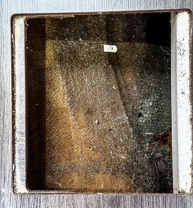 Slide: The Image of Interior storage compartment of a 2017 Lagoon 42 catamaran, showcasing under-seat space. - 35