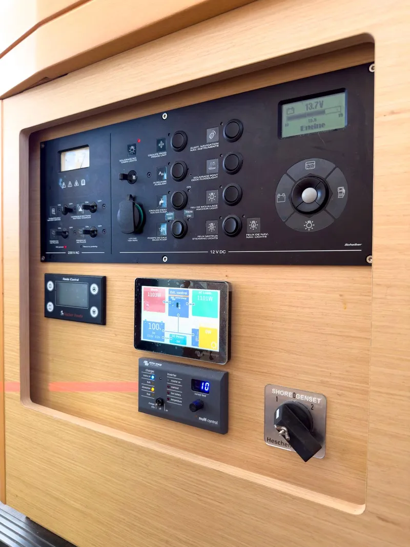 Slide: The Image of Access panel on Lagoon 42 catamaran, revealing interior components and wiring. - 41